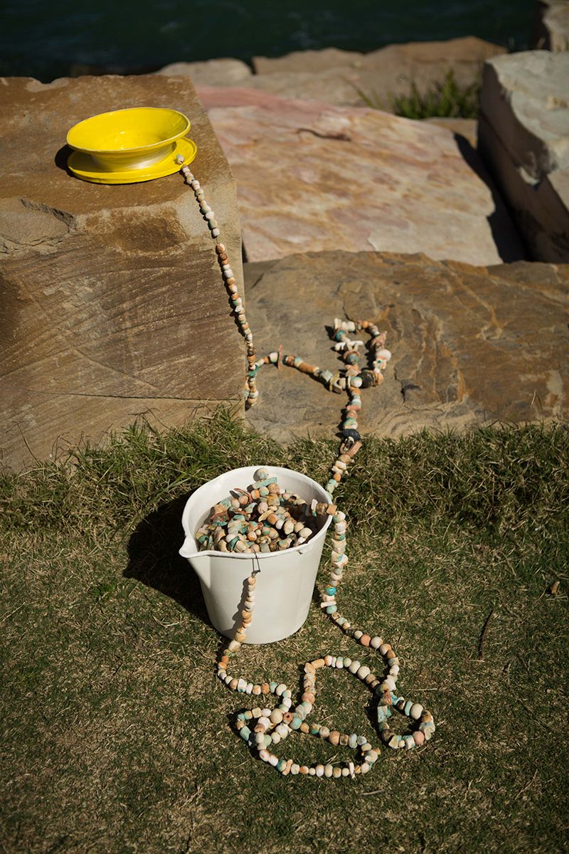 Bucket of Barangaroo Beads and Caster